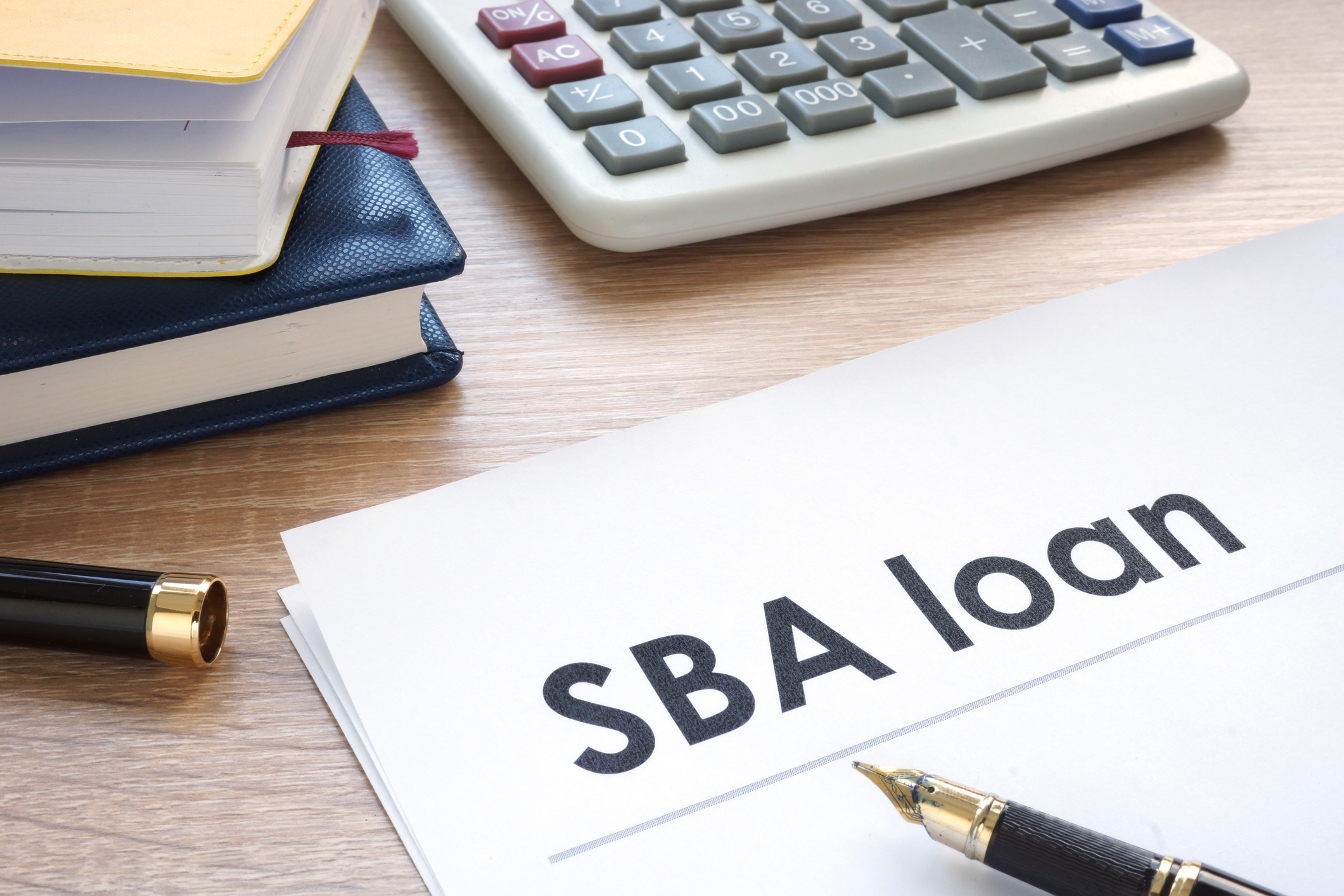 Find Your Financing for Your New Medical Practice, SBA loan form on office table